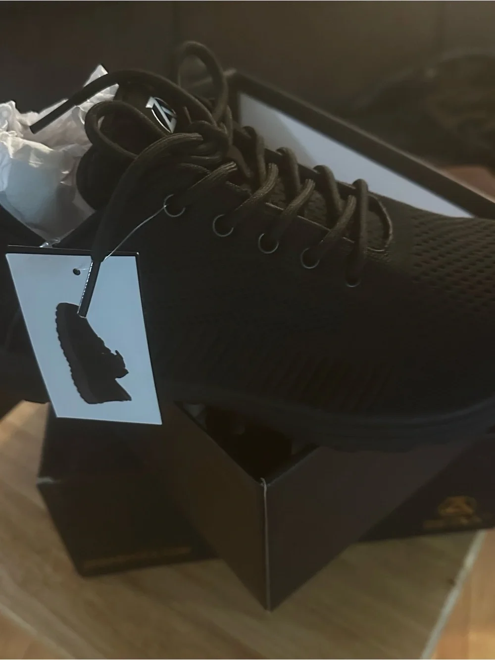 Men’s Black Shoes with Gold Logo Accents